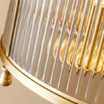 Close-up of H65 Brass and Ribbed Glass Texture