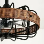 Close-up of Hand-Woven Natural Rattan on Black Caged Fandelier