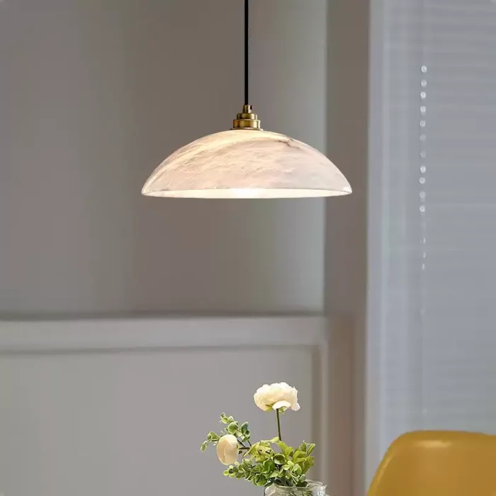 Alabaster pendant lights over kitchen island