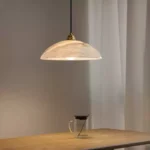 Alabaster pendant lights over kitchen island
