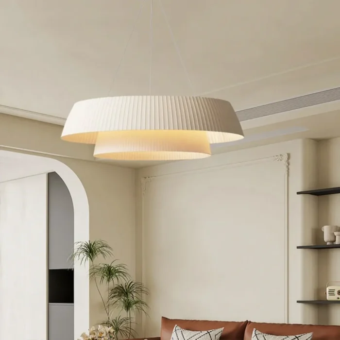 warm-lighting-pleated-fabric-pendant-above-bed