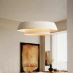 warm-lighting-pleated-fabric-pendant-above-bed
