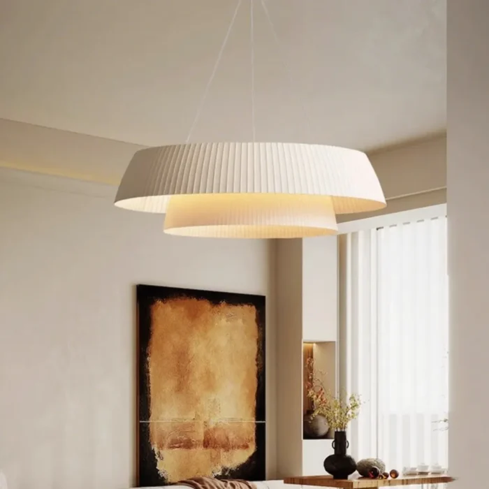 warm-lighting-pleated-fabric-pendant-above-bed