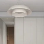 warm-lighting-pleated-fabric-pendant-above-bed