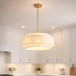 White Tiered Raffia Chandelier over Minimalist Dining Table