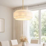 White Tiered Raffia Chandelier over Minimalist Dining Table